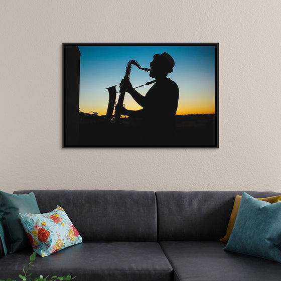 "Silhouette of a Man Playing Saxophone during Sunset", Victor Freitas