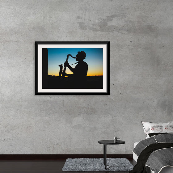 "Silhouette of a Man Playing Saxophone during Sunset", Victor Freitas