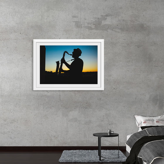 "Silhouette of a Man Playing Saxophone during Sunset", Victor Freitas