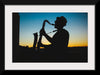 "Silhouette of a Man Playing Saxophone during Sunset", Victor Freitas