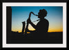 "Silhouette of a Man Playing Saxophone during Sunset", Victor Freitas