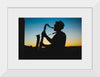 "Silhouette of a Man Playing Saxophone during Sunset", Victor Freitas