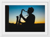 "Silhouette of a Man Playing Saxophone during Sunset", Victor Freitas