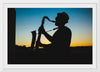 "Silhouette of a Man Playing Saxophone during Sunset", Victor Freitas