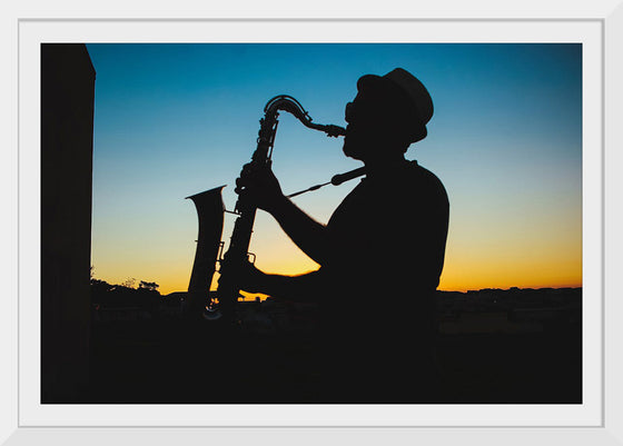 "Silhouette of a Man Playing Saxophone during Sunset", Victor Freitas