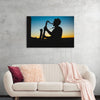 "Silhouette of a Man Playing Saxophone during Sunset", Victor Freitas