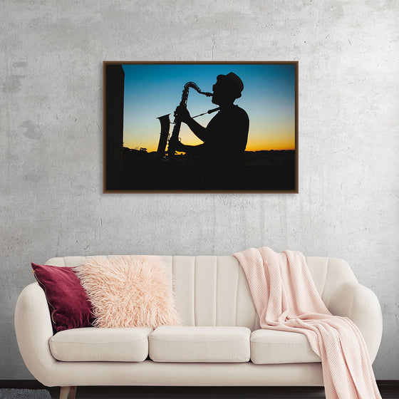 "Silhouette of a Man Playing Saxophone during Sunset", Victor Freitas