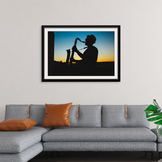 "Silhouette of a Man Playing Saxophone during Sunset", Victor Freitas