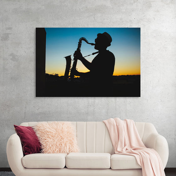 "Silhouette of a Man Playing Saxophone during Sunset", Victor Freitas