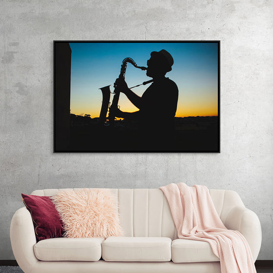 "Silhouette of a Man Playing Saxophone during Sunset", Victor Freitas