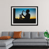 "Silhouette of a Man Playing Saxophone during Sunset", Victor Freitas