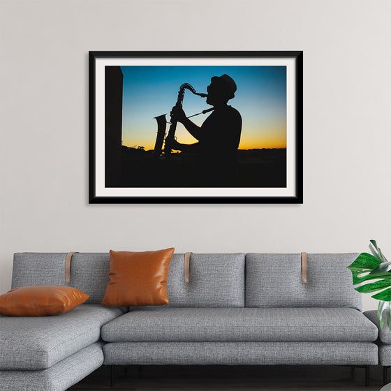 "Silhouette of a Man Playing Saxophone during Sunset", Victor Freitas