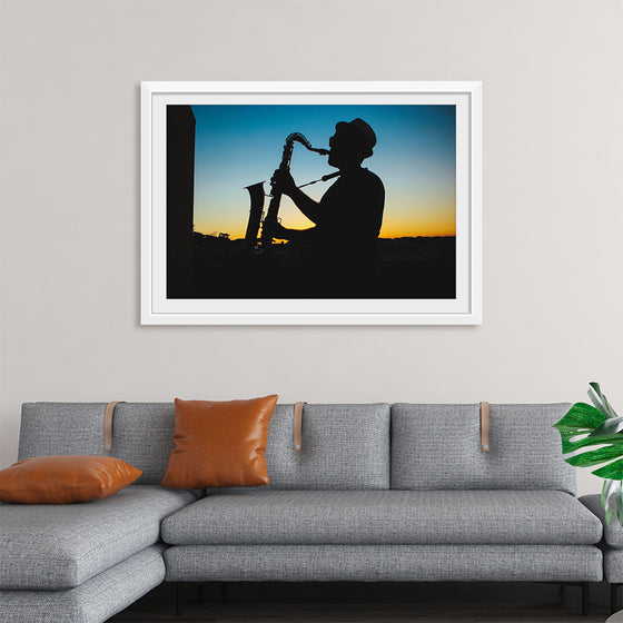 "Silhouette of a Man Playing Saxophone during Sunset", Victor Freitas