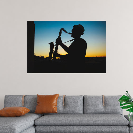 "Silhouette of a Man Playing Saxophone during Sunset", Victor Freitas