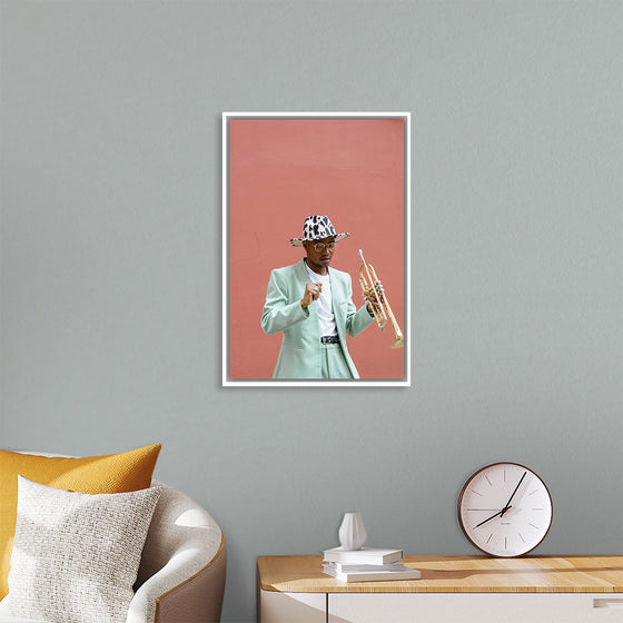 "Man in Teal Suit Holding Trumpet"