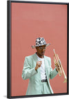 "Man in Teal Suit Holding Trumpet"