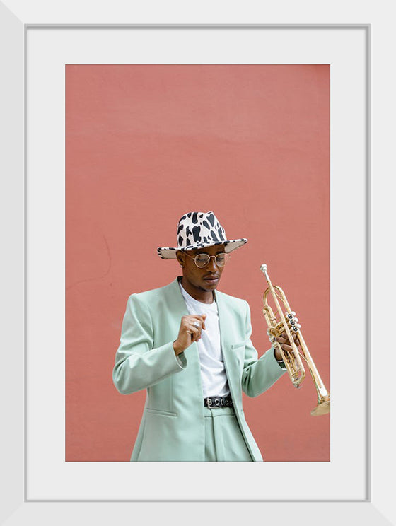 "Man in Teal Suit Holding Trumpet"