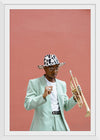 "Man in Teal Suit Holding Trumpet"