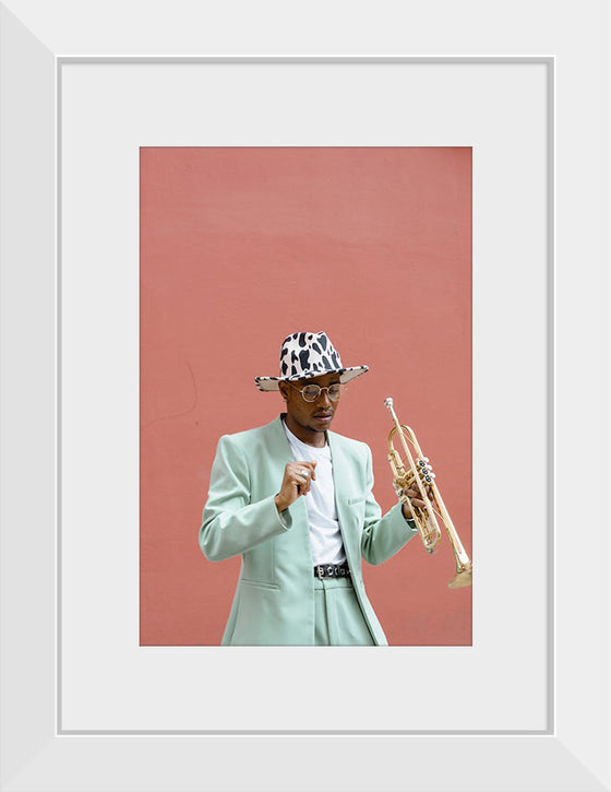 "Man in Teal Suit Holding Trumpet"