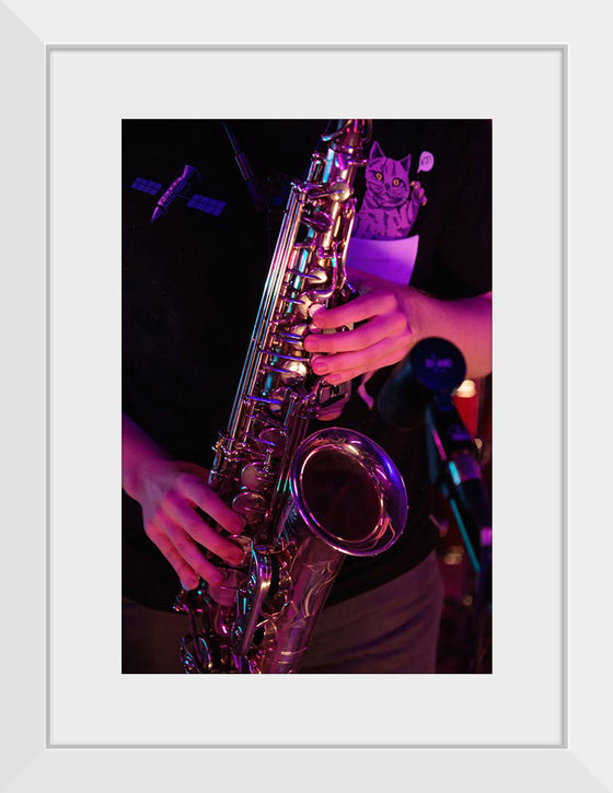 "Person Playing Saxophone"