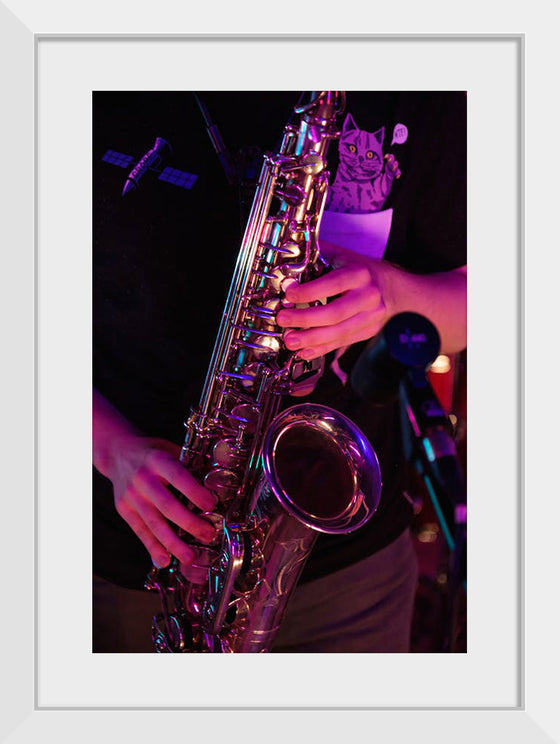 "Person Playing Saxophone"