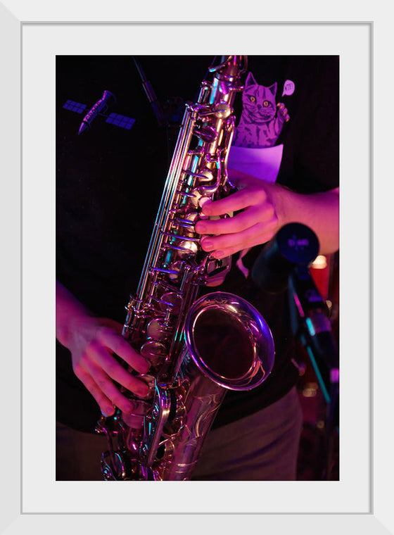 "Person Playing Saxophone"