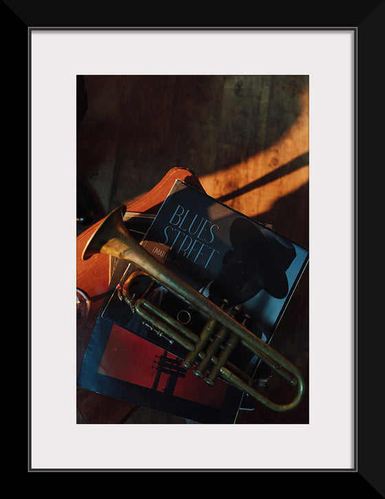 "Trumpet on Top of Stacked Vinyl Records"