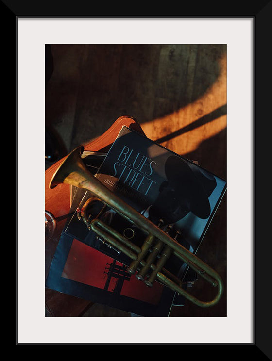 "Trumpet on Top of Stacked Vinyl Records"