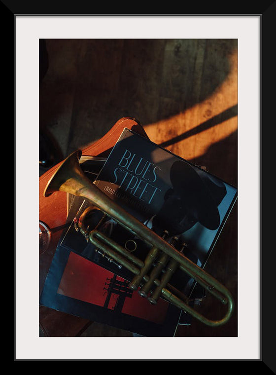 "Trumpet on Top of Stacked Vinyl Records"