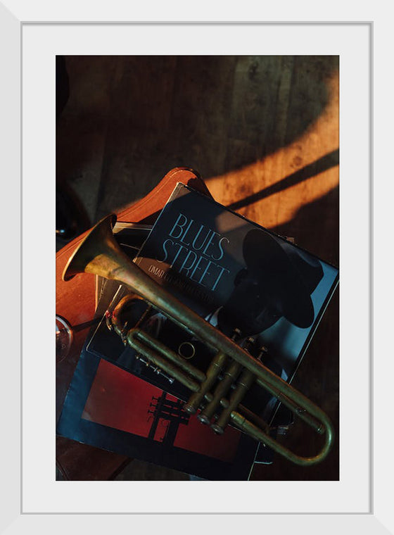 "Trumpet on Top of Stacked Vinyl Records"