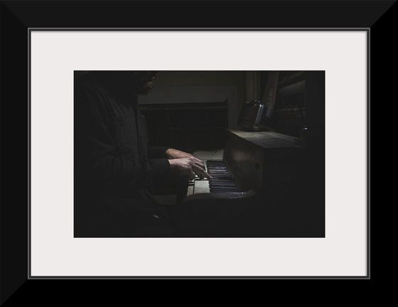 "Man Playing an Old Piano"