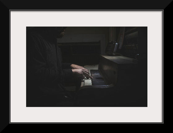 "Man Playing an Old Piano"