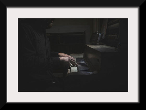 "Man Playing an Old Piano"