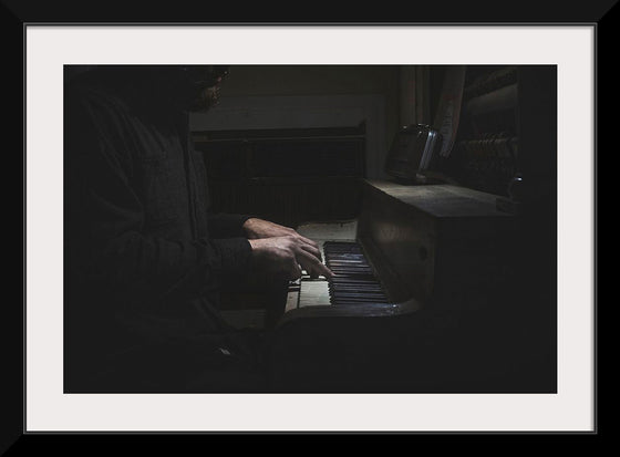 "Man Playing an Old Piano"