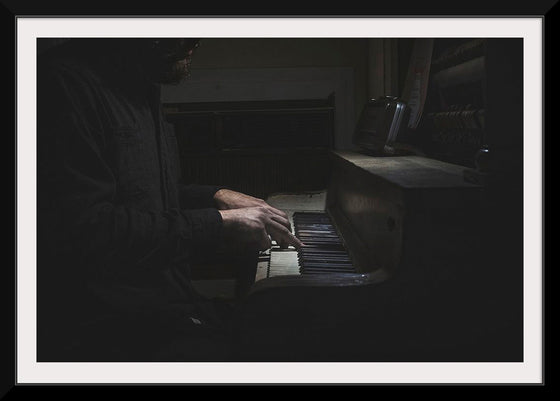 "Man Playing an Old Piano"