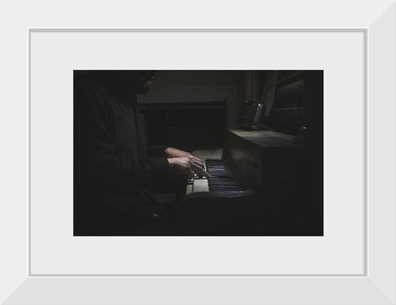 "Man Playing an Old Piano"