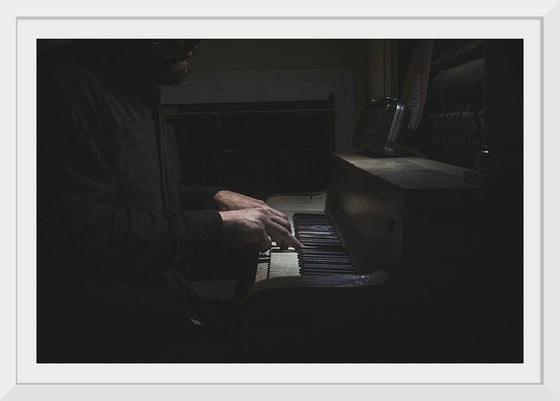 "Man Playing an Old Piano"