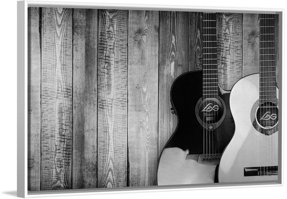 "Two Grayscale Acoustic Guitars"