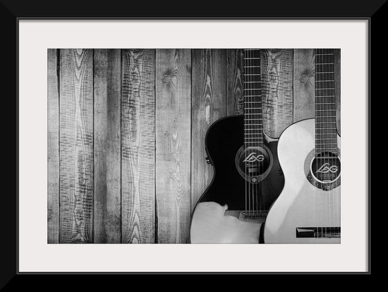 "Two Grayscale Acoustic Guitars"