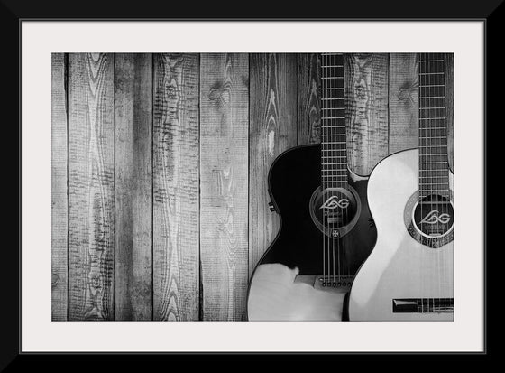 "Two Grayscale Acoustic Guitars"