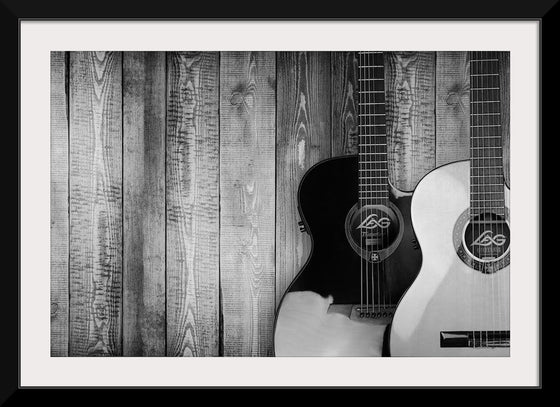 "Two Grayscale Acoustic Guitars"