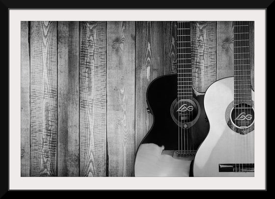 "Two Grayscale Acoustic Guitars"