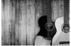 "Two Grayscale Acoustic Guitars"