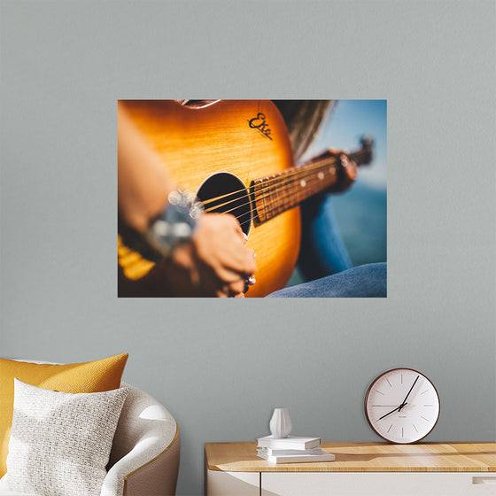 "Person Play Guitar in Close-up Photo"