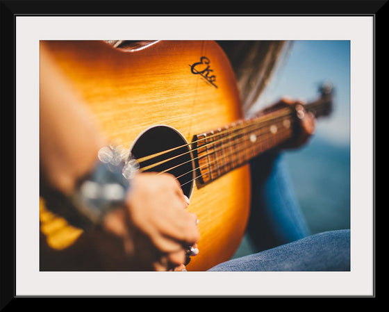 "Person Play Guitar in Close-up Photo"