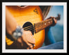 "Person Play Guitar in Close-up Photo"