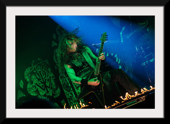 "Person Playing Guitar on Stage With Light Ray", Thibault Trillet