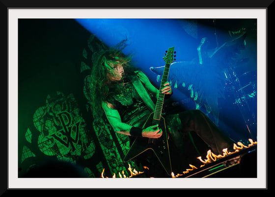 "Person Playing Guitar on Stage With Light Ray", Thibault Trillet