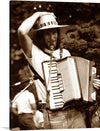 Immerse yourself in the nostalgic allure of this captivating artwork, capturing a passionate accordion player lost in the melody. The sepia tones evoke a sense of timeless elegance, transporting you to a serene, musical moment frozen in time. Every detail, from the rustic straw hat shading the musician’s face to the intricate design of the accordion, is meticulously captured to breathe life and emotion into your space.