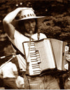 "Smiling Musician with Accordion"